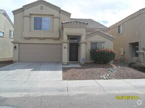 Building Photo - 11219 W College Dr