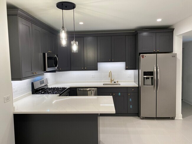 Foto del edificio - 1114 N Hoyne Ave