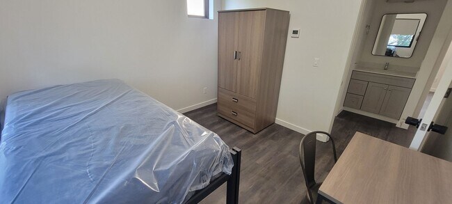 Building Photo - Beds Available Newly Renovated Building , ...