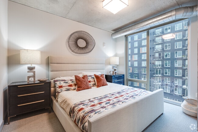 1BR, 1BA + Den - 870SF - Bedroom - Nordhaus Apartment Homes