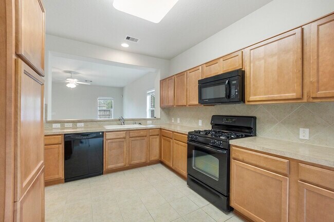 Foto del edificio - 831 Honeysuckle Vine Dr