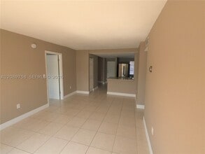 Building Photo - 9911 W Okeechobee Rd