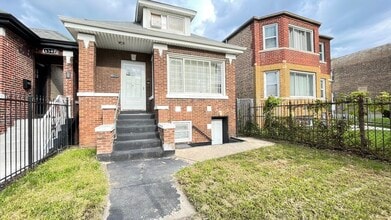 Building Photo - 6511 S Vernon Ave
