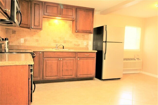 Foto del edificio - 422 W Burleson St