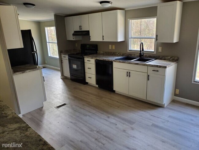 Foto del edificio - 4 br, 2 bath Mobile Home - 579 Hill Trace Rd