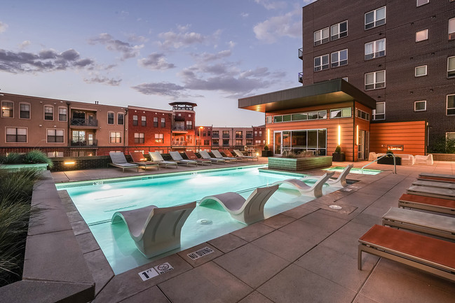 Resort style outdoor pool courtyard with year round spa - The Casey