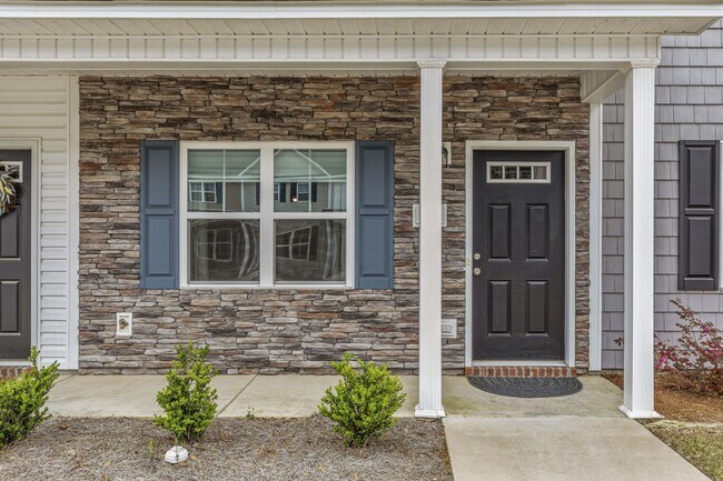 Building Photo - Marshall Farms Beauty with Dual Suites & Open-Concept Living