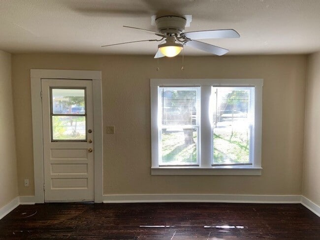 Building Photo - *COMING SOON* Charming Cottage Retreat with Fenced Yard!