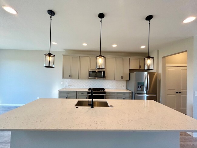 Building Photo - Impressive 4 Bedroom Townhome Nestled in M...