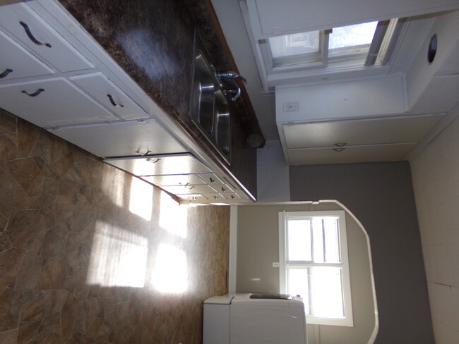 Building Photo - Nice 4BDRM House Wood Floors