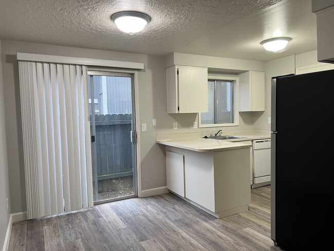 Dining space to kitchen - 5119 SW 62nd Ave