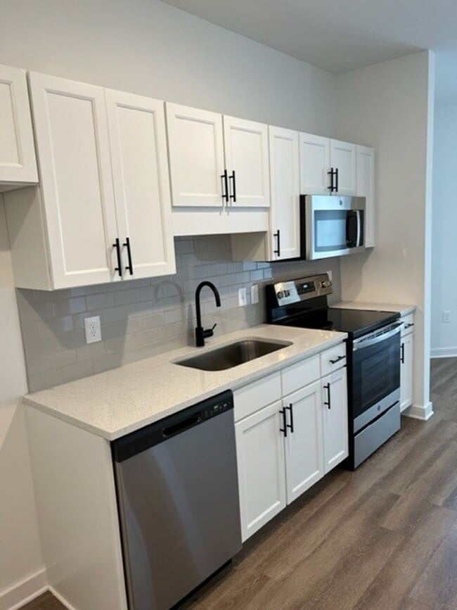 Building Photo - Beautiful New Construction in Gated Community within Minutes to Downtown!