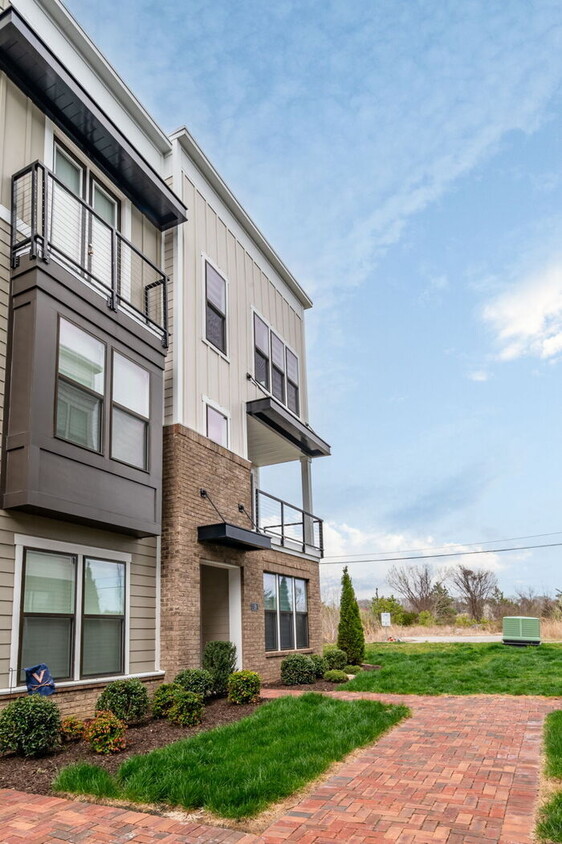 Primary Photo - Modern End-Unit Townhome in Rocketts Landi...