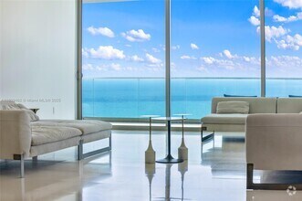 Building Photo - 10201 Collins Ave