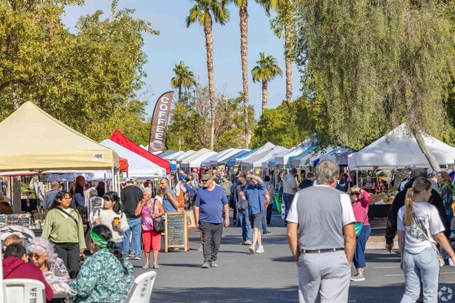 Residents fill the streets during the Yumma Community Farmers' Market.
