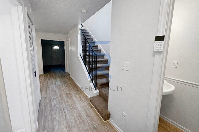 Building Photo - Charming 2BR/1.5BA All-Electric Home Next to Community Playground!