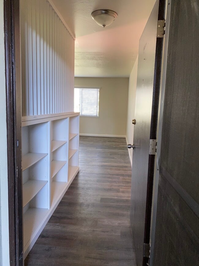 Shelves along entry - 258 Pamela Dr
