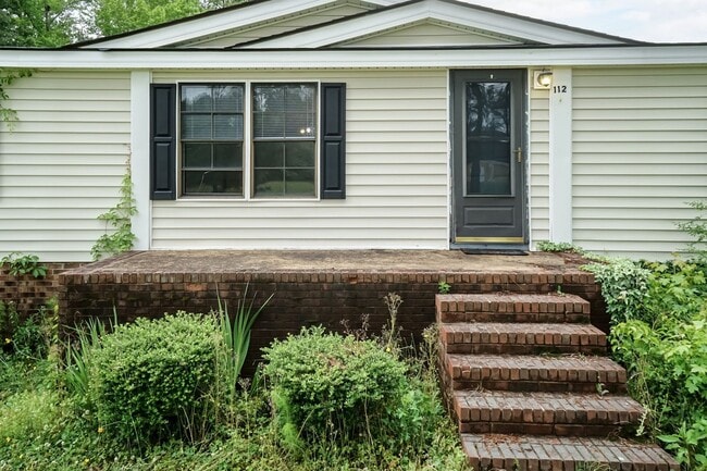 Building Photo - Enjoy Peaceful Living at this Property in ...
