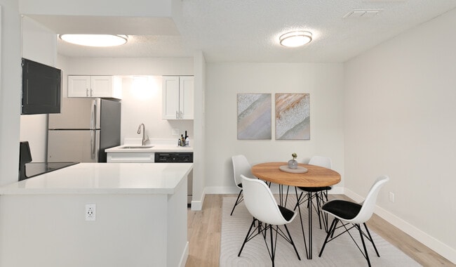 Kitchens features stainless steel appliances and updated cabinetry - Creekside