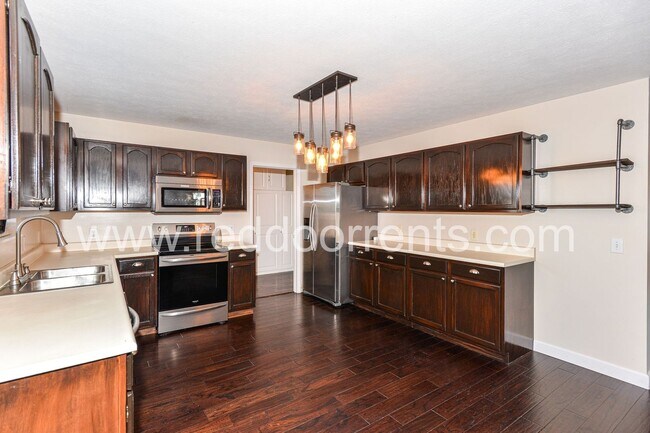 Building Photo - Tranquil Waterside Oasis: Your Ideal 4BR R...