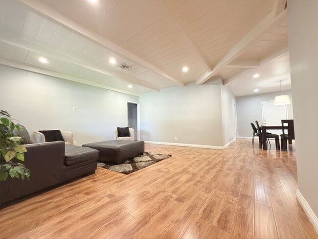 Building Photo - 4-Bedroom Home with Expansive Backyard in ...