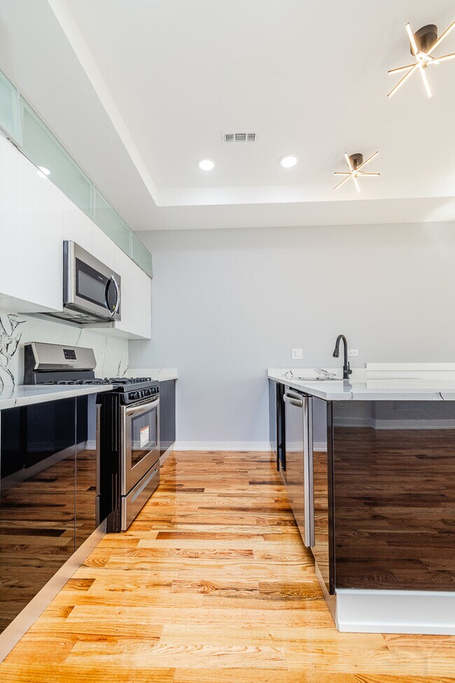 Foto del edificio - 6334 S Langley Ave