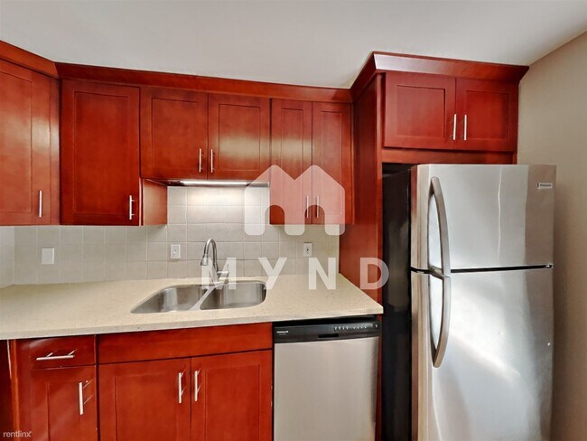 Building Photo - 3 br, 2 bath Condo - 1606 103rd Place Nort...