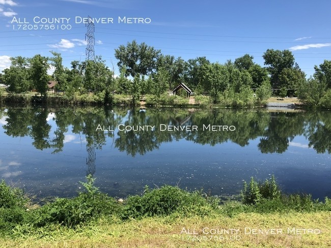 Building Photo - Beautiful Condo is Four Acre Lake in Arvada