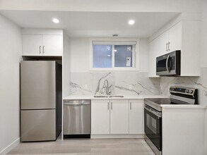 Building Photo - 6123-6133 33 Ave NW