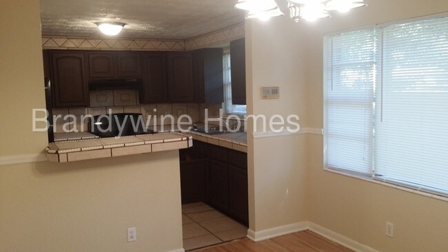 Building Photo - 6421 Manhattan Dr