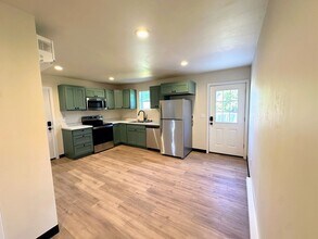 Building Photo - 1201-1203-1203 S Atrium Ct