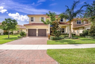 Building Photo - 9761 S Miralago Way