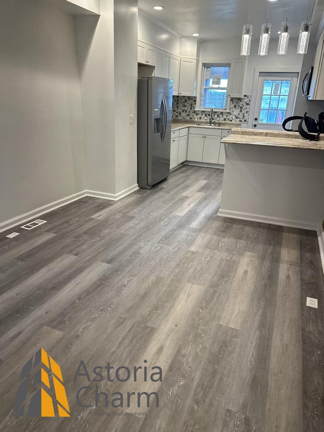 3 Bedroom End Unit with Finished Basement and Fenced Yard on E 28th Street - 3 Bedroom End Unit with Finished Basement and Fenced Yard on E 28th Street