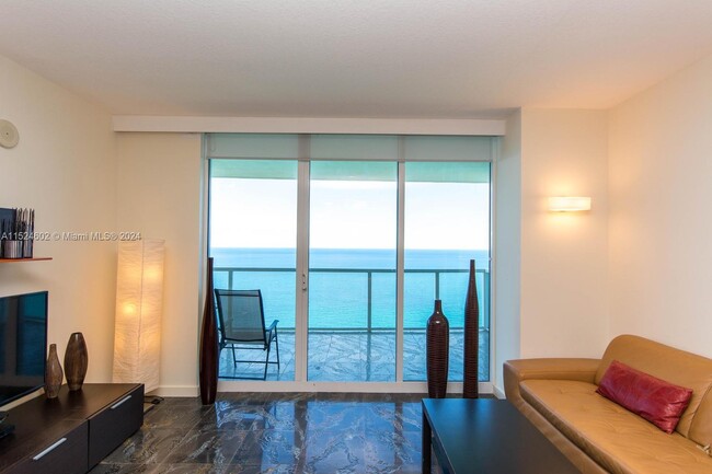 Building Photo - 16699 Collins Ave