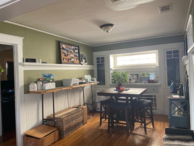 Naturally well lit dining space with original built in china cabinet. - 688 Mira Mar Ave