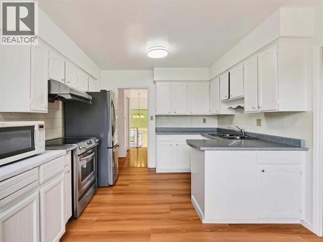 Building Photo - 6031 Alta Ct