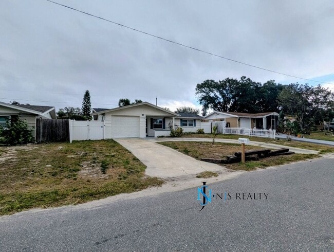 Building Photo - NEW FLOORS, NEW PAINT INSIDE & OUT.. 2/1/1...