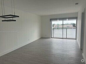 Building Photo - 8560 N Sherman Cir