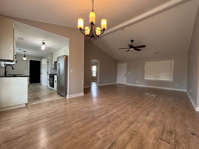 Building Photo - You will LOVE the fenced yard!