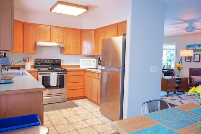 Kitchen with updated stainless steel appliances. - 1508 Kinnikinnick St