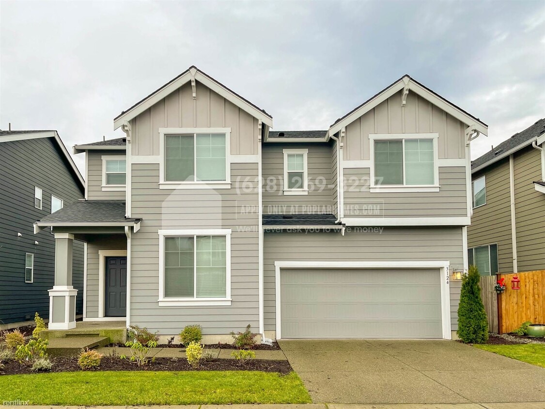 Foto principal - 4 br, 2.5 bath House - 3124 14th Ave Ct NW -