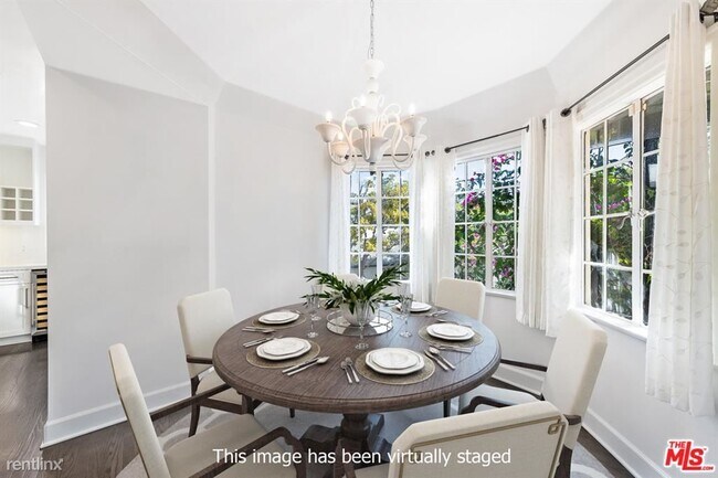 Foto del edificio - 4 br, 2.5 bath House - 11128 Montana Ave