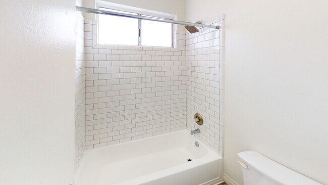 Baño - Berryman Apts...Newly Remodeled Apartments Available...Large Windows...Washer/Dryer in Unit!