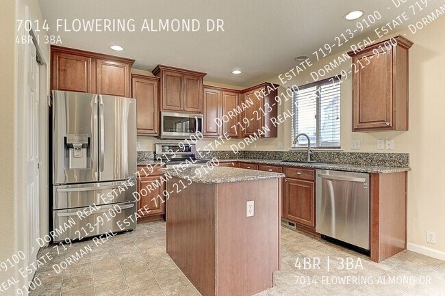 Foto del edificio - 7014 Flowering Almond Dr
