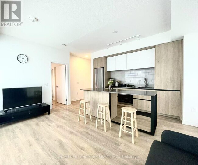 Photo du bâtiment - 225-W225 Sumach St