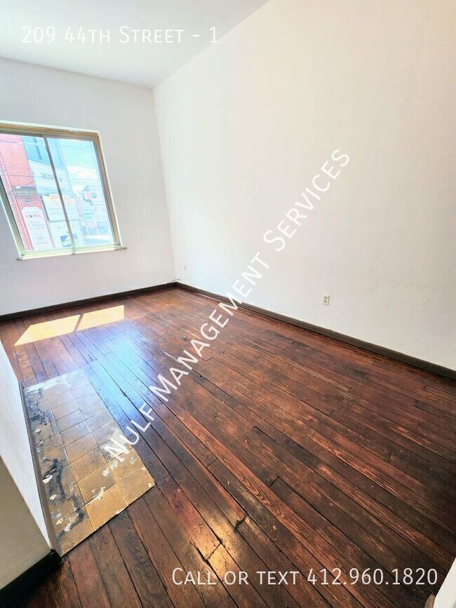 Building Photo - 209 44th St