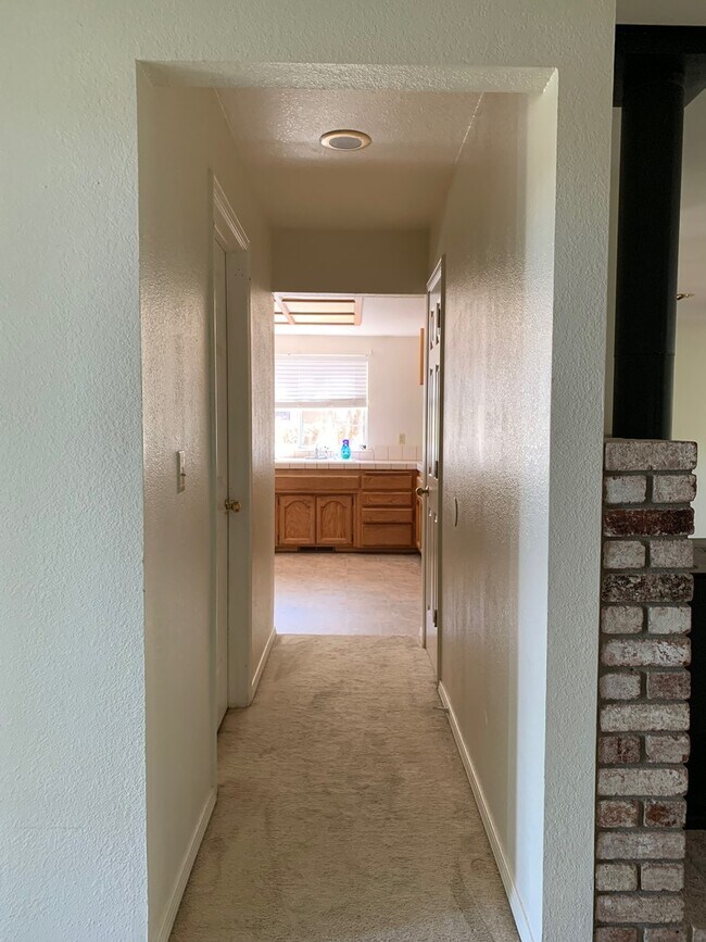 Building Photo - Spacious 3-Bedroom Home with Greenbelt Views & Landscaping Included
