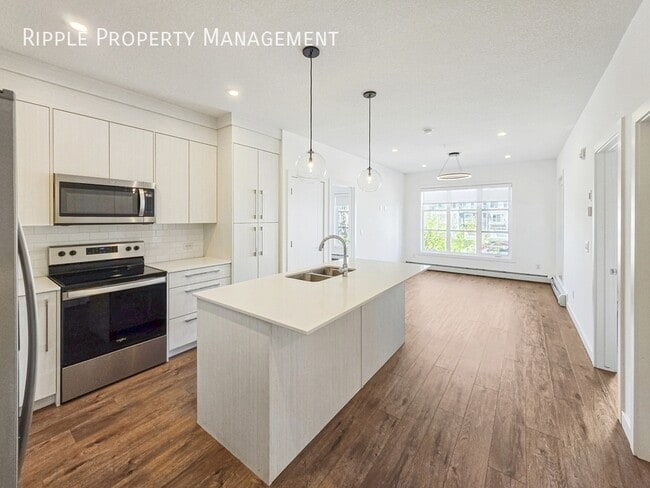 Building Photo - MODERN & SPACIOUS 2 BEDS, 2 BATHS CONDO UNIT | UNDERGROUND PARKING & PET SPA IN SAVANNA II
