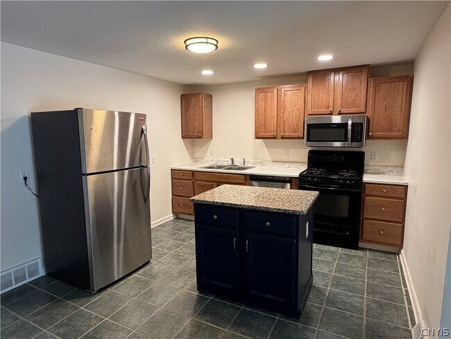 Foto del edificio - 8587 Caughdenoy Rd