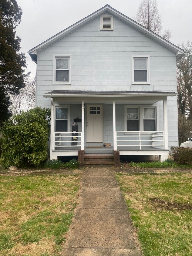Basement Apartment entry is on the left - 6641 Osborn St